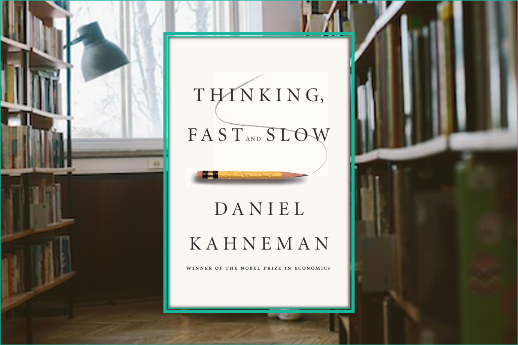 Thinking, Fast and Slow book cover by Daniel Kahneman with pencil on the cover.